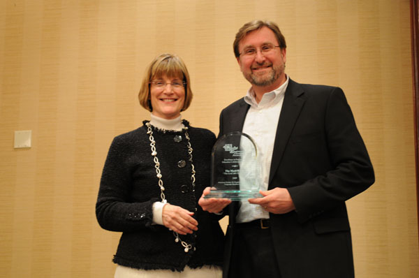Letha Hammon, DuPont and Peter Janzow, MathWorks, representing The EcoCAR Challenge accepting award